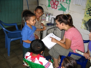Speech therapist Virginia Carbonell singing along with children with speech impairment