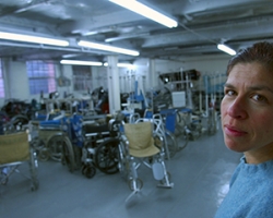 Danielle Butin with repurposed wheelchairs
