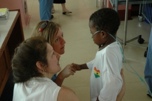 Judy Hurley (left) and Chris Placidi, two of the coordinators of the mission, say goodbye to Lisa