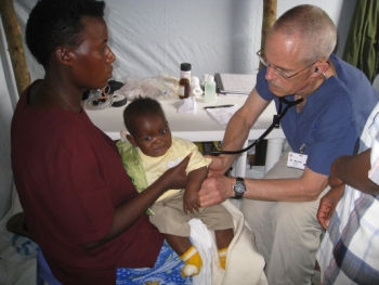 Doctor with mother and child