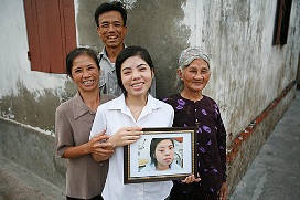 Nguyen Thi Phuong and her parents and grandmother